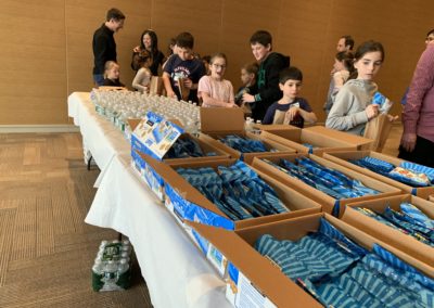 FSAG assembles snack bags for A Place to Turn, a Natick food pantry