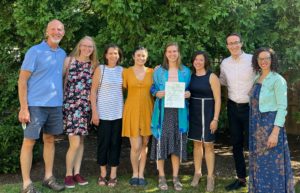 Erin Billings celebrates her conversion ceremony with TBE leadership and family