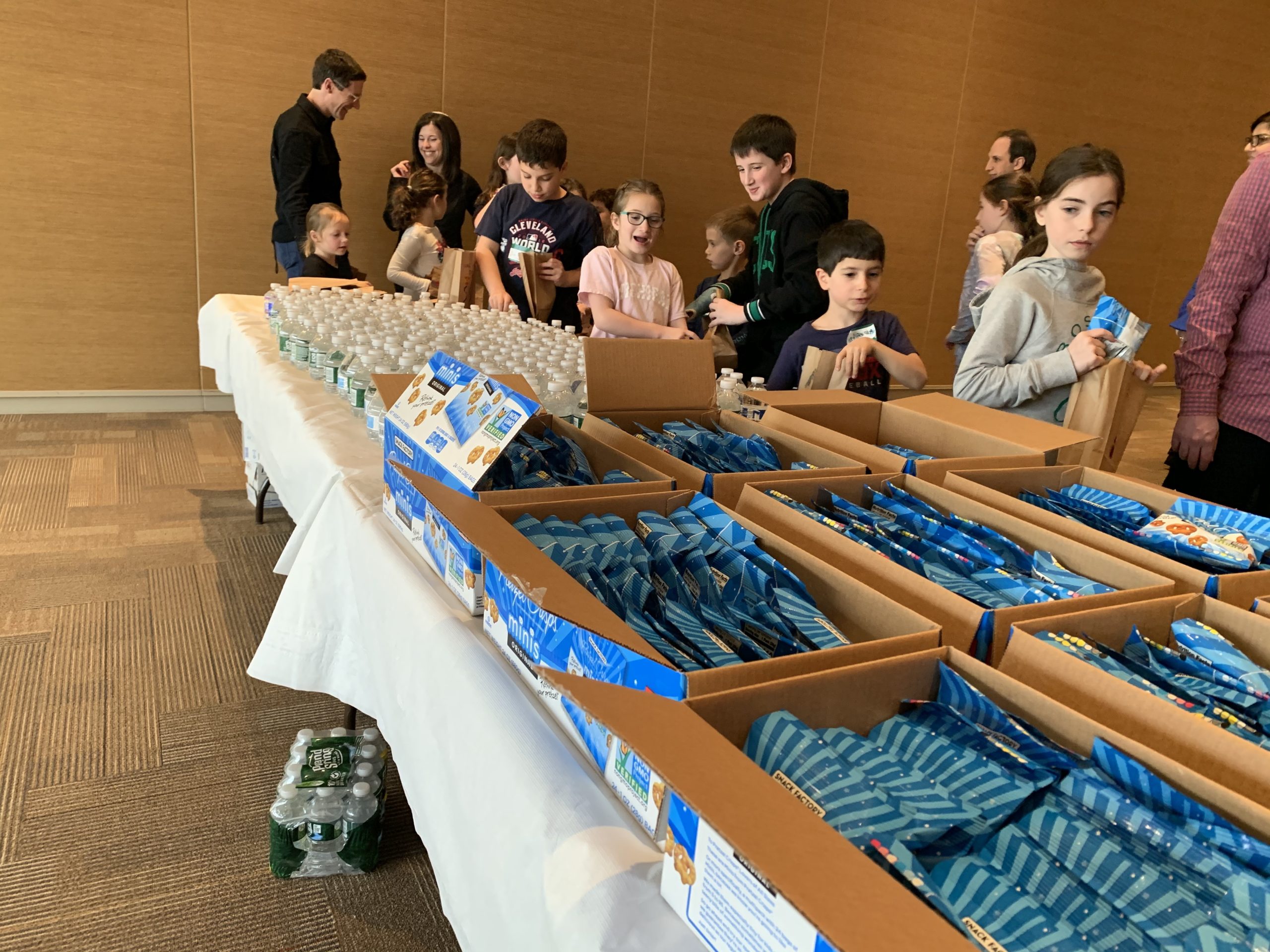 FSAG assembles snack bags for A Place to Turn, a Natick food pantry