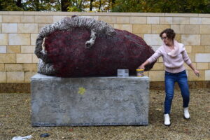 Caron Tabb installs her sculpture in the TBE courtyard.